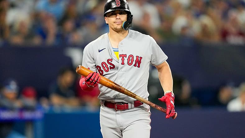 Jul 2, 2023; Toronto, Ontario, CAN; Boston Red Sox shortstop Enrique Hernandez (5) reacts to a striking out against the Toronto Blue Jays at Rogers Centre. Mandatory Credit: Kevin Sousa-USA TODAY Sports