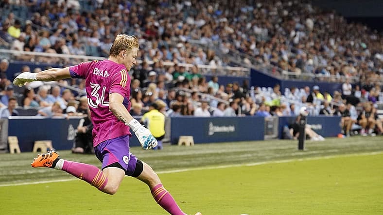 Jun 24, 2023; Kansas City, Kansas, USA; Chicago Fire goalkeeper Chris Brady (34) puts the ball in play against Sporting Kansas City during the match at Children's Mercy Park. Mandatory Credit: Denny Medley-USA TODAY Sports