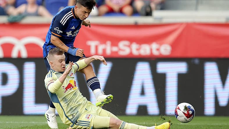 Jul 12, 2023; Harrison, New Jersey, USA; New York Red Bulls forward Cameron Harper (17) blocks a shot by FC Cincinnati midfielder Alvaro Barreal (31) during the first half at Red Bull Arena. Mandatory Credit: Brad Penner-USA TODAY Sports