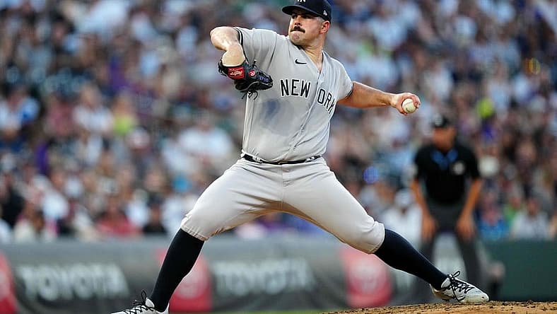 Jul 14, 2023; Denver, Colorado, USA; New York Yankees starting pitcher Carlos Rodon (55) pitches in fifth inning against the Colorado Rockies at Coors Field. Mandatory Credit: Ron Chenoy-USA TODAY Sports