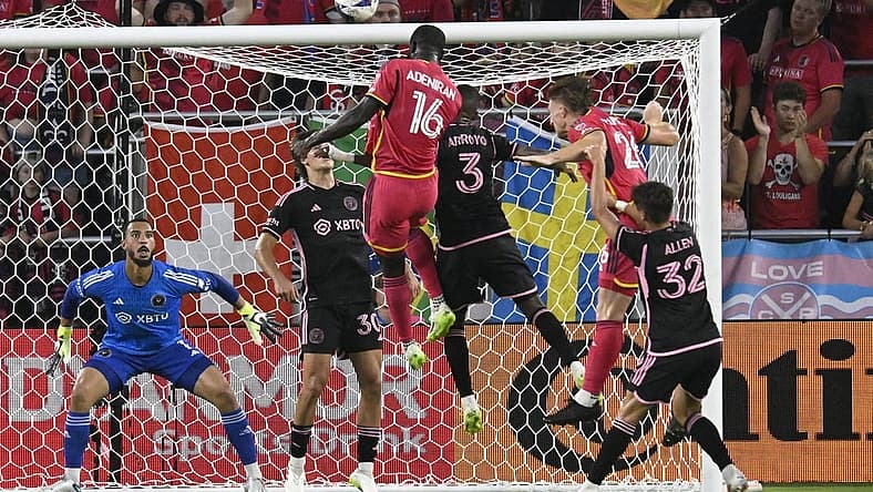 Jul 15, 2023; St. Louis, Missouri, USA; St. Louis City player Samuel Adeniran (16) heads the ball for a goal against Inter Miami midfielder Dixon Arroyo (3) and Inter Miami goalkeeper Drake Callender (1) in the first half at CITYPARK. Mandatory Credit: Scott Rovak-USA TODAY Sports