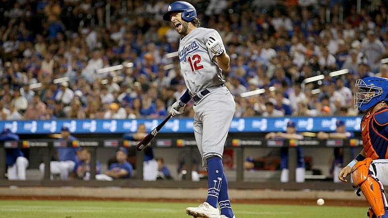 Jul 15, 2023; New York City, New York, USA; Los Angeles Dodgers outfielder Jake Marisnick (12) reacts after being hit by a pitch during the eighth inning against the New York Mets at Citi Field. Mandatory Credit: Brad Penner-USA TODAY Sports
