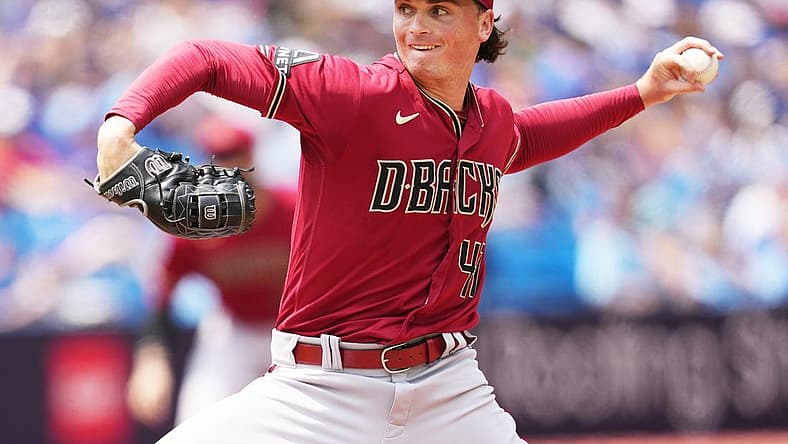Jul 16, 2023; Toronto, Ontario, CAN; Arizona Diamondbacks starting pitcher Tommy Henry (47) throws pitch against the Toronto Blue Jays during the first inning at Rogers Centre. Mandatory Credit: Nick Turchiaro-USA TODAY Sports