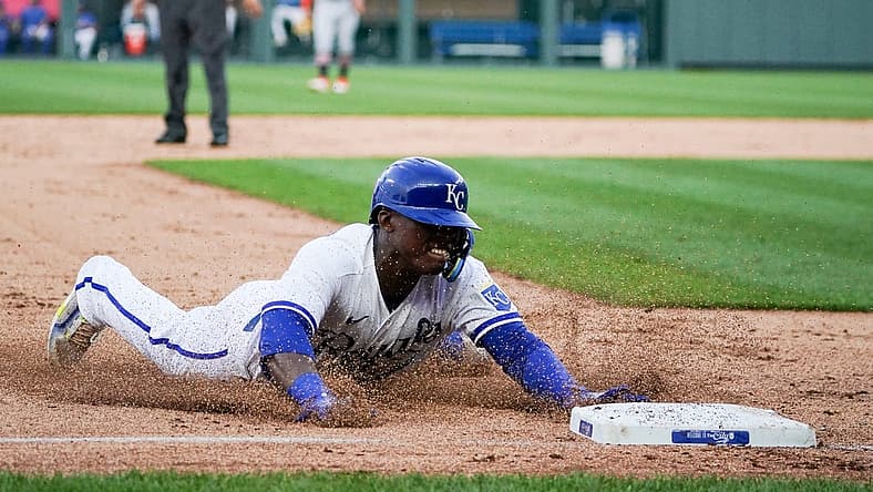 Jul 18, 2023; Kansas City, Missouri, USA; Kansas City Royals right fielder Dairon Blanco (44) reaches on a one run triple against the Detroit Tigers in the third inning at Kauffman Stadium. Mandatory Credit: Denny Medley-USA TODAY Sports