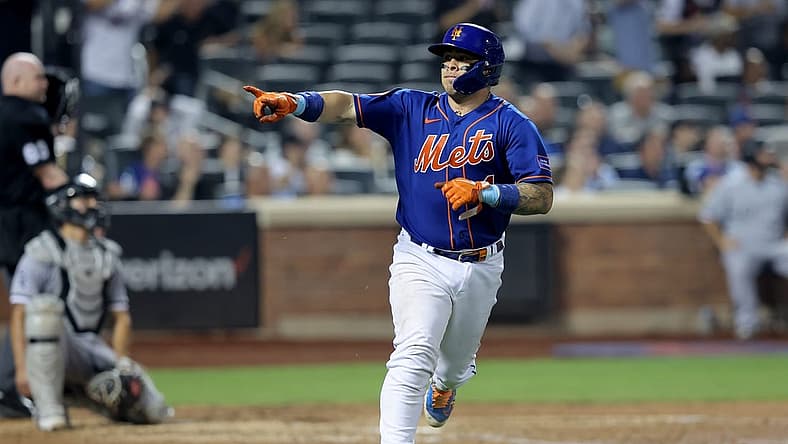 Jul 18, 2023; New York City, New York, USA; New York Mets catcher Francisco Alvarez (4) points into the dugout as he rounds the bases after hitting a two run home run against the Chicago White Sox during the sixth inning at Citi Field. Mandatory Credit: Brad Penner-USA TODAY Sports