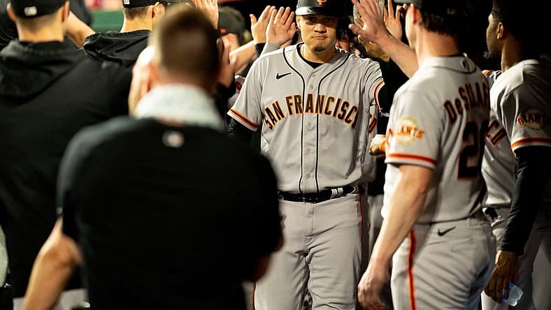 San Francisco Giants first baseman Wilmer Flores (41) celebrates with teammates after hitting a game tying 3-run home run in the third inning of the MLB baseball game between the Cincinnati Reds and San Francisco Giants at Great American Ball Park in Cincinnati on Tuesday, July 18, 2023.