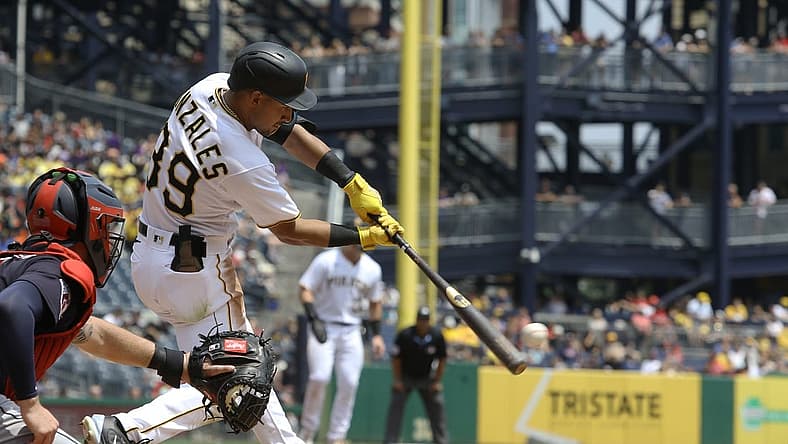 Jul 19, 2023; Pittsburgh, Pennsylvania, USA;  Pittsburgh Pirates second baseman Nick Gonzales (39) hits an RBI single against the Cleveland Guardians during the fifth inning at PNC Park. Mandatory Credit: Charles LeClaire-USA TODAY Sports