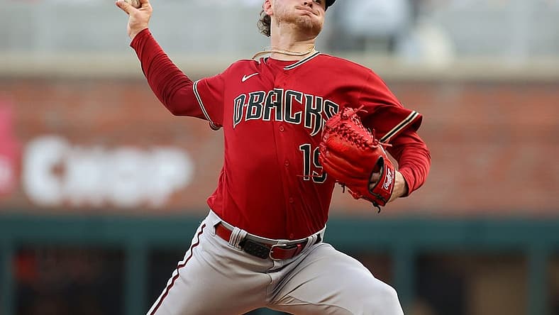 Jul 19, 2023; Atlanta, Georgia, USA; Arizona Diamondbacks starting pitcher Ryne Nelson (19) throws against the Atlanta Braves in the first inning at Truist Park. Mandatory Credit: Brett Davis-USA TODAY Sports