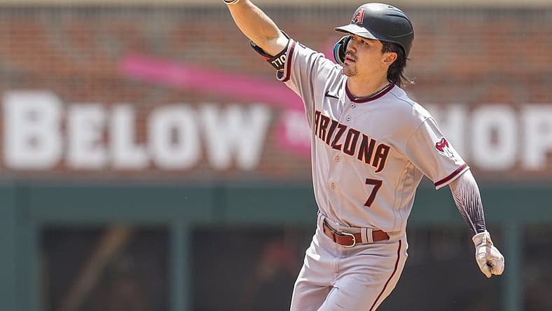 Jul 20, 2023; Cumberland, Georgia, USA; Arizona Diamondbacks left fielder Corbin Carroll (7) reacts after hitting a home run against the Atlanta Braves during the eighth inning at Truist Park. Mandatory Credit: Dale Zanine-USA TODAY Sports