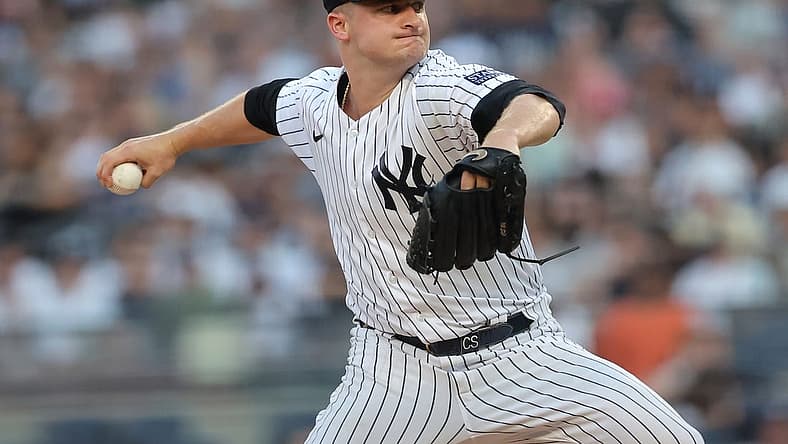 Jul 21, 2023; Bronx, New York, USA; New York Yankees starting pitcher Clarke Schmidt (36) pitches against the Kansas City Royals during the first inning at Yankee Stadium. Mandatory Credit: Brad Penner-USA TODAY Sports