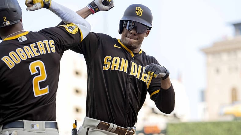 Jul 21, 2023; Detroit, Michigan, USA;  San Diego Padres left fielder Juan Soto (22) (right) celebrates with shortstop Xander Bogaerts (2) after hitting a two-run home run off Detroit Tigers starting pitcher Reese Olson (45) (not pictured) in the third inning at Comerica Park. Mandatory Credit: Lon Horwedel-USA TODAY Sports