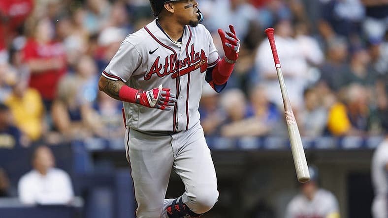 Jul 21, 2023; Milwaukee, Wisconsin, USA; Atlanta Braves shortstop Orlando Arcia (11) flips his bat after hitting a home run during the second inning against the Milwaukee Brewers at American Family Field. Mandatory Credit: Jeff Hanisch-USA TODAY Sports