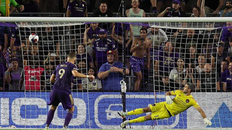 Jul 21, 2023; Orlando, FL, USA; Orlando City forward Ercan Kara (9) scores a goal during the penalty kick shoot out after the game against Houston Dynamo at Exploria Stadium. Mandatory Credit: Cory Knowlton-USA TODAY Sports