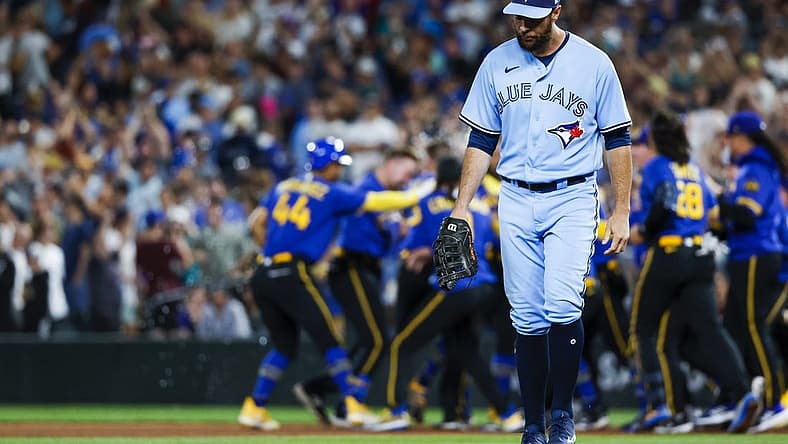 Jul 21, 2023; Seattle, Washington, USA; Toronto Blue Jays first baseman Brandon Belt (13) walks back to the dugout following a 3-2 loss to the Seattle Mariners during the ninth inning at T-Mobile Park. Mandatory Credit: Joe Nicholson-USA TODAY Sports