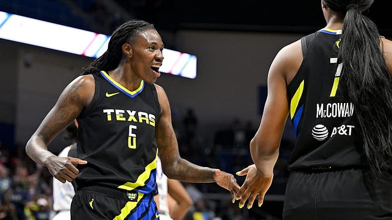 Jul 22, 2023; Arlington, Texas, USA; g6 and center Teaira McCowan (7) celebrate during the second half against the Los Angeles Sparks at College Park Center. Mandatory Credit: Jerome Miron-USA TODAY Sports