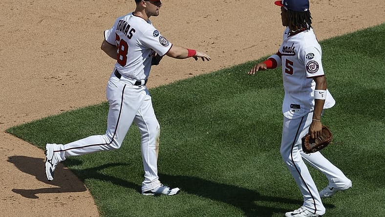 Jul 23, 2023; Washington, District of Columbia, USA; Washington Nationals right fielder Lane Thomas (28) celebrates with Nationals shortstop CJ Abrams (5) after their game San Francisco Giants at Nationals Park. Mandatory Credit: Geoff Burke-USA TODAY Sports