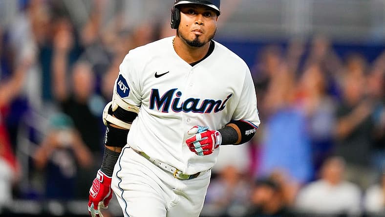 Jul 23, 2023; Miami, Florida, USA; Miami Marlins second baseman Luis Arraez (3) runs to first base after hitting the winning hit against the Colorado Rockies during the tenth inning at loanDepot Park. Mandatory Credit: Rich Storry-USA TODAY Sports