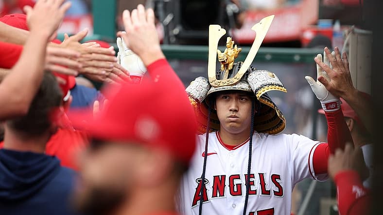 Jul 23, 2023; Anaheim, California, USA;  Los Angeles Angels designated hitter Shohei Ohtani (17) is greeted in the dugout after hitting a home run during the first inning against the Pittsburgh Pirates at Angel Stadium. Mandatory Credit: Kiyoshi Mio-USA TODAY Sports