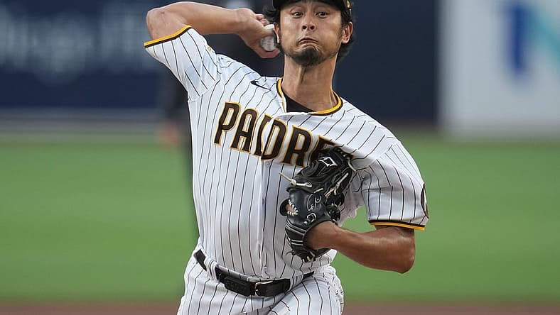 Jul 24, 2023; San Diego, California, USA; San Diego Padres starting pitcher Yu Darvish (11) throws a pitch against the Pittsburgh Pirates during the first inning at Petco Park. Mandatory Credit: Ray Acevedo-USA TODAY Sports