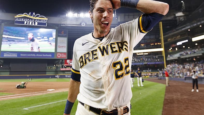 Jul 24, 2023; Milwaukee, Wisconsin, USA; Milwaukee Brewers left fielder Christian Yelich (22) reacts after being dunked with Gatorade following the game against the Cincinnati Reds at American Family Field. Mandatory Credit: Jeff Hanisch-USA TODAY Sports