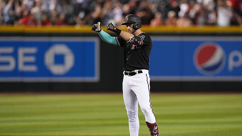 iJul 24, 2023; Phoenix, Arizona, USA; Arizona Diamondbacks third baseman Evan Longoria (3) reacts after hitting a two RBI double against the St. Louis Cardinals during the seventh inning at Chase Field. Mandatory Credit: Joe Camporeale-USA TODAY Sports