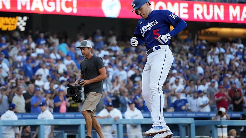 Jul 25, 2023; Los Angeles, California, USA; Los Angeles Dodgers first baseman Freddie Freeman (5) crosses home plate after hitting a solo home run in the first inning against the Toronto Blue Jays at Dodger Stadium. Mandatory Credit: Kirby Lee-USA TODAY Sports