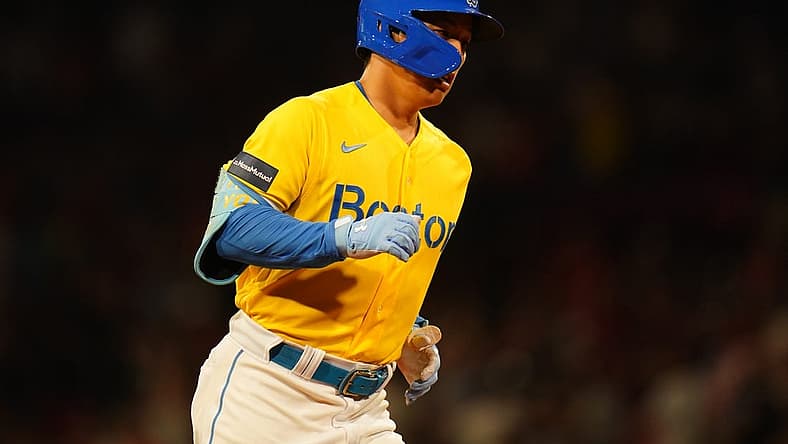 Jul 25, 2023; Boston, Massachusetts, USA; Boston Red Sox left fielder Masataka Yoshida (7) hits a two run home run against the Atlanta Braves in the eighth inning at Fenway Park. Mandatory Credit: David Butler II-USA TODAY Sports