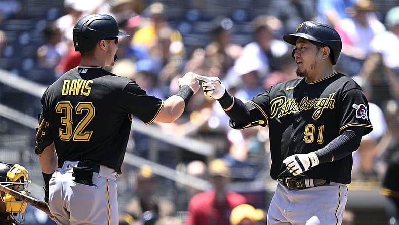 Jul 26, 2023; San Diego, California, USA; Pittsburgh Pirates first baseman Ji-Man Choi (91) is congratulated by right fielder Henry Davis (32) after hitting a home run against the San Diego Padres during the second inning at Petco Park. Mandatory Credit: Orlando Ramirez-USA TODAY Sports