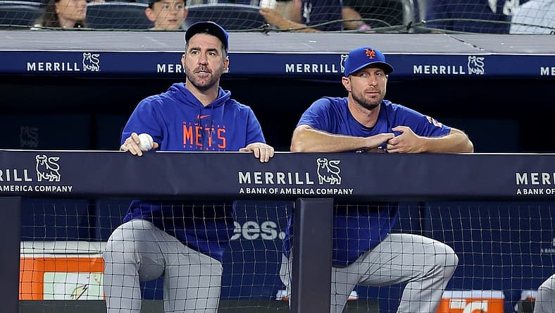 Jul 26, 2023; Bronx, New York, USA; New York Mets starting pitchers Justin Verlander (35) and Max Scherzer (21) watch from the dugout during the sixth inning against the New York Yankees at Yankee Stadium. Mandatory Credit: Brad Penner-USA TODAY Sports