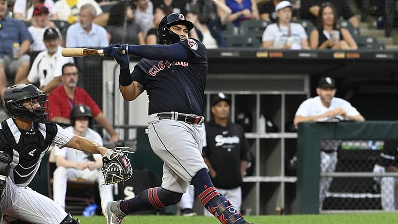 Jul 27, 2023; Chicago, Illinois, USA; Cleveland Guardians first baseman Josh Naylor (22) hits a two-RBI double against the Chicago White Sox during the third inning at  Guaranteed Rate Field. Mandatory Credit: Matt Marton-USA TODAY Sports