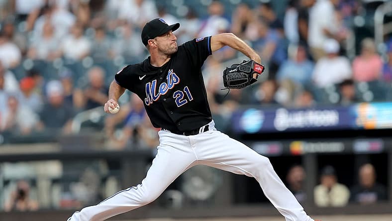 Jul 28, 2023; New York City, New York, USA; New York Mets starting pitcher Max Scherzer (21) pitches against the Washington Nationals during the first inning at Citi Field. Mandatory Credit: Brad Penner-USA TODAY Sports