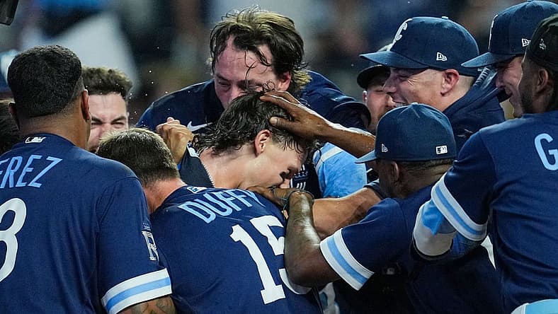 Jul 28, 2023; Kansas City, Missouri, USA; Kansas City Royals shortstop Bobby Witt Jr. (7) celebrates with teammates after hitting a walk-off grand slam against the Minnesota Twins during the tenth inning at Kauffman Stadium. Mandatory Credit: Jay Biggerstaff-USA TODAY Sports