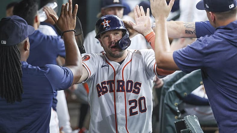Jul 29, 2023; Houston, Texas, USA; Houston Astros designated hitter Chas McCormick (20) is congratulated after scoring during the fifth inning against the Tampa Bay Rays at Minute Maid Park. Mandatory Credit: Troy Taormina-USA TODAY Sports