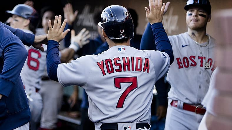 Jul 29, 2023; San Francisco, California, USA; Boston Red Sox left fielder Masataka Yoshida (7) celebrates in the dugout after scoring against the San Francisco Giants during the ninth inning at Oracle Park. Mandatory Credit: John Hefti-USA TODAY Sports