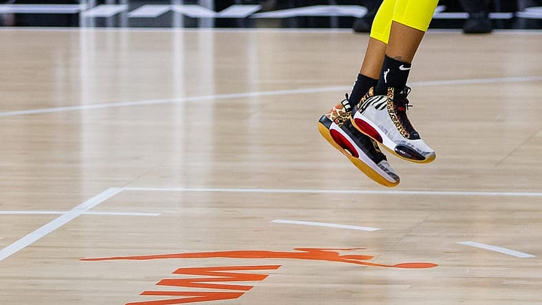 Oct 2, 2020; Bradenton, Florida, USA; The shoes of Seattle Storm guard Jordin Canada (21) with the WNBA logo during game 1 of the WNBA finals against the Las Vegas Aces at IMG Academy. Mandatory Credit: Mary Holt-USA TODAY Sports