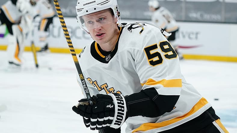Apr 3, 2021; Boston, Massachusetts, USA; Pittsburgh Penguins left wing Jake Guentzel (59) warms up before the start of the game against the Boston Bruins at TD Garden. Mandatory Credit: David Butler II-USA TODAY Sports