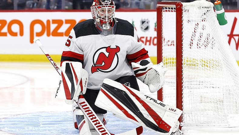 Dec 3, 2021; Winnipeg, Manitoba, CAN; New Jersey Devils goaltender Jonathan Bernier (45) warms up before start of the second period against the Winnipeg Jets at Canada Life Centre. Mandatory Credit: James Carey Lauder-USA TODAY Sports