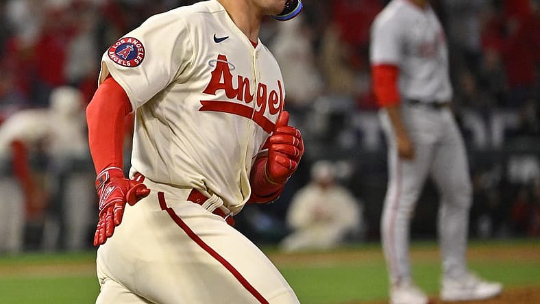 Apr 11, 2023; Anaheim, California, USA; Los Angeles Angels catcher Logan O'Hoppe (14) heads to first on a solo home run in the sixth inning against the Washington Nationals at Angel Stadium. Mandatory Credit: Jayne Kamin-Oncea-USA TODAY Sports