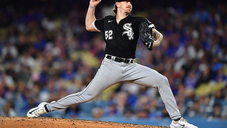 Jun 14, 2023; Los Angeles, California, USA; Chicago White Sox starting pitcher Mike Clevinger (52) throws against the Los Angeles Dodgers during the fourth inning at Dodger Stadium. Mandatory Credit: Gary A. Vasquez-USA TODAY Sports