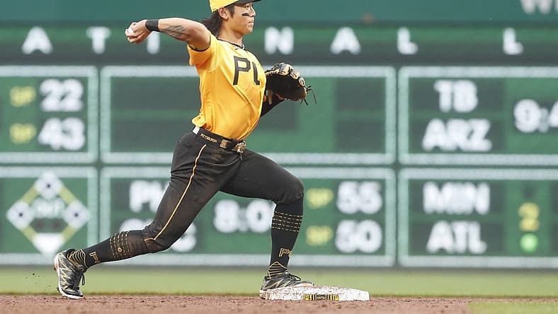 Jun 27, 2023; Pittsburgh, Pennsylvania, USA; Pittsburgh Pirates center fielder Ji Hwan Bae (3) throws to first base to complete a double play against the San Diego Padres during the third inning at PNC Park. Mandatory Credit: Charles LeClaire-USA TODAY Sports