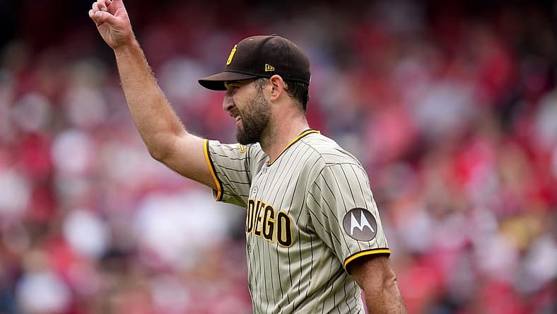San Diego Padres starting pitcher Michael Wacha (52) gestures toward San Diego Padres center fielder Trent Grisham (1) after completing a catch in the second inning during a baseball game between the San Diego Padres and the Cincinnati Reds, Saturday, July 1, 2023, at Great American Ball Park in Cincinnati.
