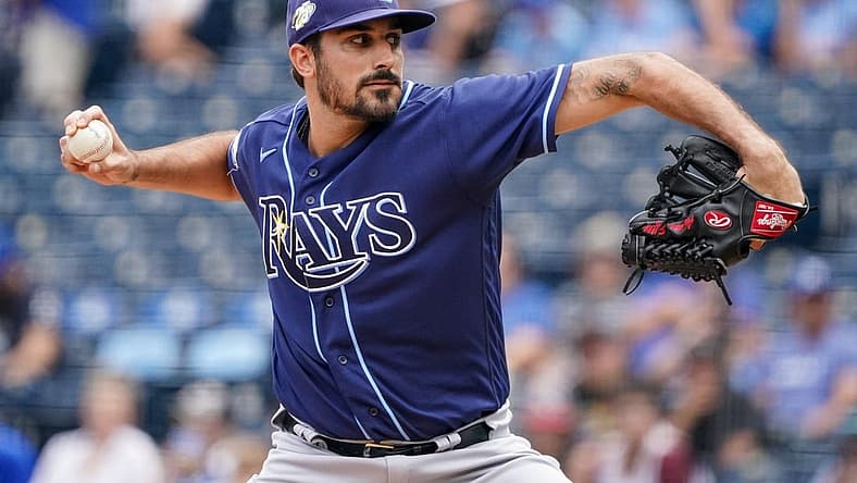Jul 16, 2023; Kansas City, Missouri, USA; Tampa Bay Rays starting pitcher Zach Eflin (24) delivers a pitch against the Kansas City Royals prior to a game at Kauffman Stadium. Mandatory Credit: Denny Medley-USA TODAY Sports