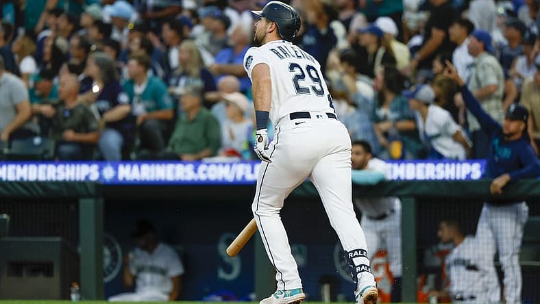 Jul 31, 2023; Seattle, Washington, USA; Seattle Mariners catcher Cal Raleigh (29) hits a solo home run against the Boston Red Sox during the seventh inning at T-Mobile Park. Mandatory Credit: Joe Nicholson-USA TODAY Sports