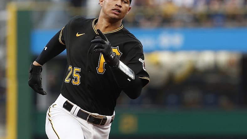 Aug 1, 2023; Pittsburgh, Pennsylvania, USA; Pittsburgh Pirates catcher Endy Rodriguez (25) runs to third base with an RBI triple against the Detroit Tigers during the second inning at PNC Park. Mandatory Credit: Charles LeClaire-USA TODAY Sports