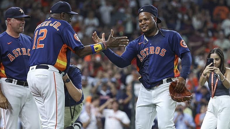 Aug 1, 2023; Houston, Texas, USA; Houston Astros starting pitcher Framber Valdez (59) celebrates with manager Dusty Baker Jr. (12) after pitching a no-hitter against the Cleveland Guardians at Minute Maid Park. Mandatory Credit: Troy Taormina-USA TODAY Sports