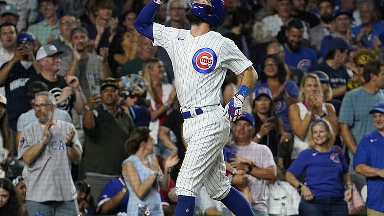 Aug 1, 2023; Chicago, Illinois, USA; Chicago Cubs shortstop Dansby Swanson (7) gestures after hitting a two-run homer against the Cincinnati Reds during the fourth inning at Wrigley Field. Mandatory Credit: David Banks-USA TODAY Sports