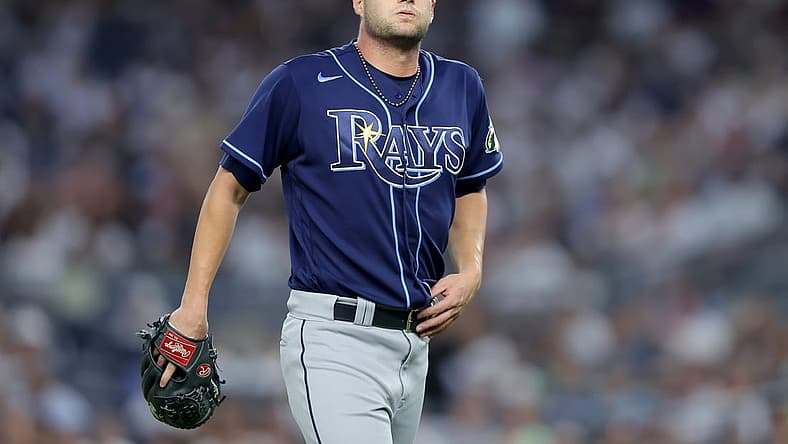 Aug 2, 2023; Bronx, New York, USA; Tampa Bay Rays starting pitcher Shane McClanahan (18) reacts during the fourth inning against the New York Yankees at Yankee Stadium. Mandatory Credit: Brad Penner-USA TODAY Sports