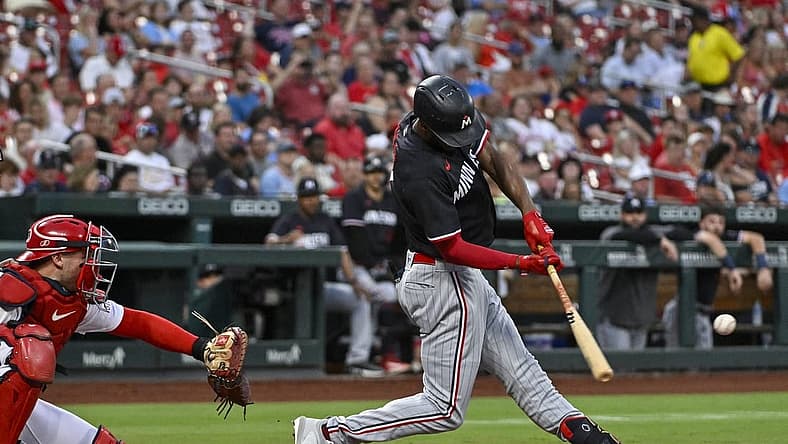 Aug 3, 2023; St. Louis, Missouri, USA; Minnesota Twins center fielder Michael A. Taylor (2) hits a two run home run against the St. Louis Cardinals during the second inning at Busch Stadium. Mandatory Credit: Jeff Curry-USA TODAY Sports