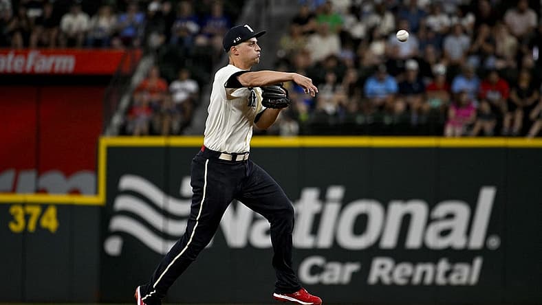 Aug 4, 2023; Arlington, Texas, USA; Texas Rangers shortstop Corey Seager (5) throws to first base during the third inning against the Miami Marlins at Globe Life Field. Mandatory Credit: Jerome Miron-USA TODAY Sports