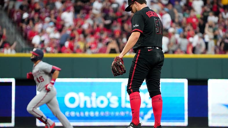 Aug 4, 2023; Cincinnati, Ohio, USA; Cincinnati Reds starting pitcher Graham Ashcraft (51) reacts after giving up a two run home run against Washington Nationals designated hitter Joey Meneses (45) during the eighth inning at Great American Ball Park. Mandatory Credit: Kareem Elgazzar-The Cincinnati Enquirer-USA TODAY Sports